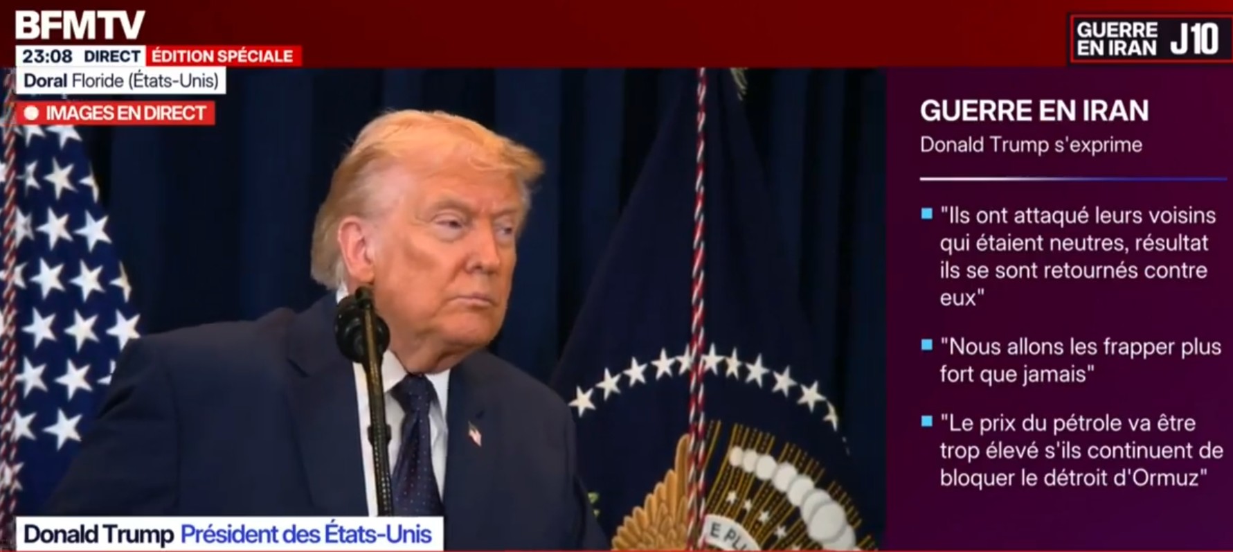 Capture d’écran d’un direct de BFMTV montrant Donald Trump, président des États-Unis, en costume bleu foncé derrière un pupitre, de profil devant des drapeaux américains et le sceau présidentiel, lors d’une prise de parole retransmise depuis Doral en Floride. L’habillage de la chaîne indique « Édition spéciale » et « Guerre en Iran – J10 ». Sur la droite de l’écran, un encart résume plusieurs citations attribuées à Trump sur le conflit, notamment des menaces de frappes accrues contre l’Iran et une référence au détroit d’Ormuz et au prix du pétrole.